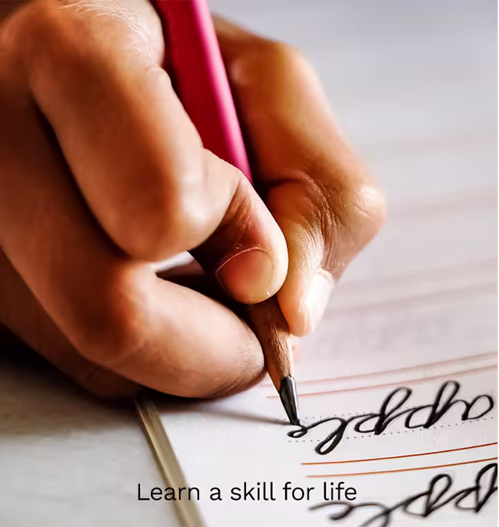 student-hand-writing-on-paper